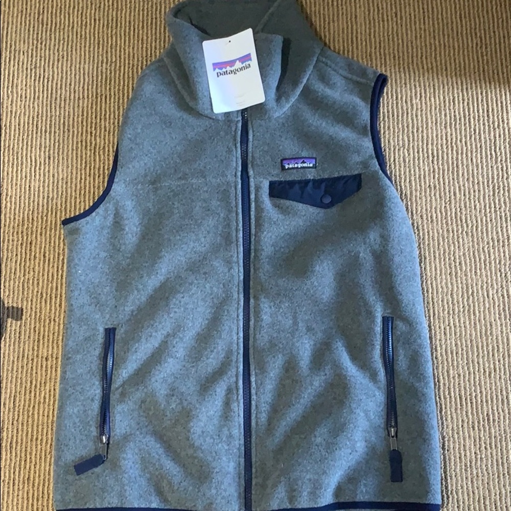 sold! Brand new women’s snap vest
